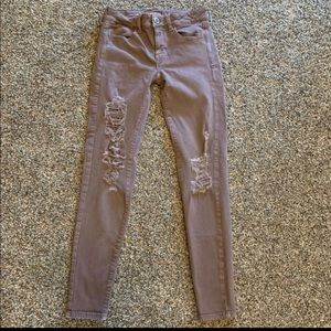 American Eagle Mauve distressed jegging